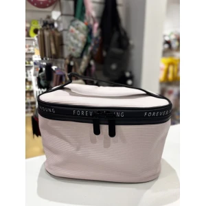 NECESSER CUERINA CON TEXTURA LINEAS "FOREVER YOUNG"