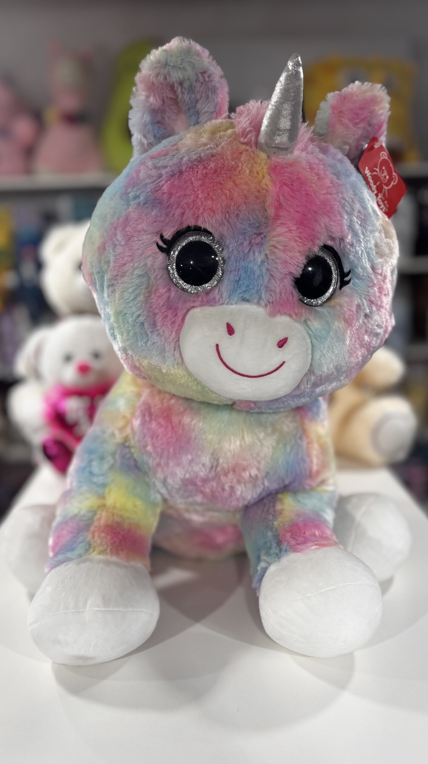 PELUCHE UNICORNIO MULTICOLOR GRANDE