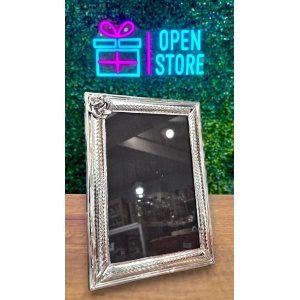 PORTARRETRATO DE ALPACA CON FLOR 15X21CM