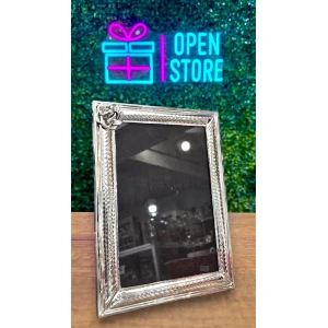 PORTARRETRATO DE ALPACA CON FLOR 15X21CM